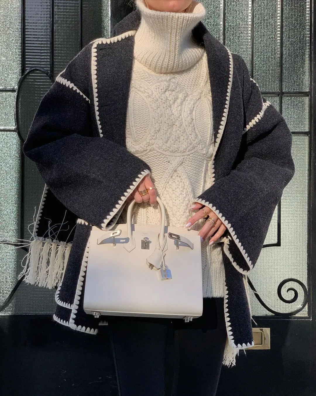 Stylish woolen coat with scarf and tassels