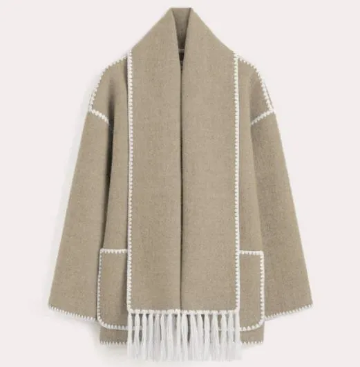 Stylish woolen coat with scarf and tassels