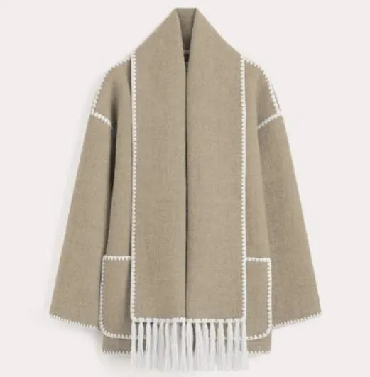 Stylish woolen coat with scarf and tassels